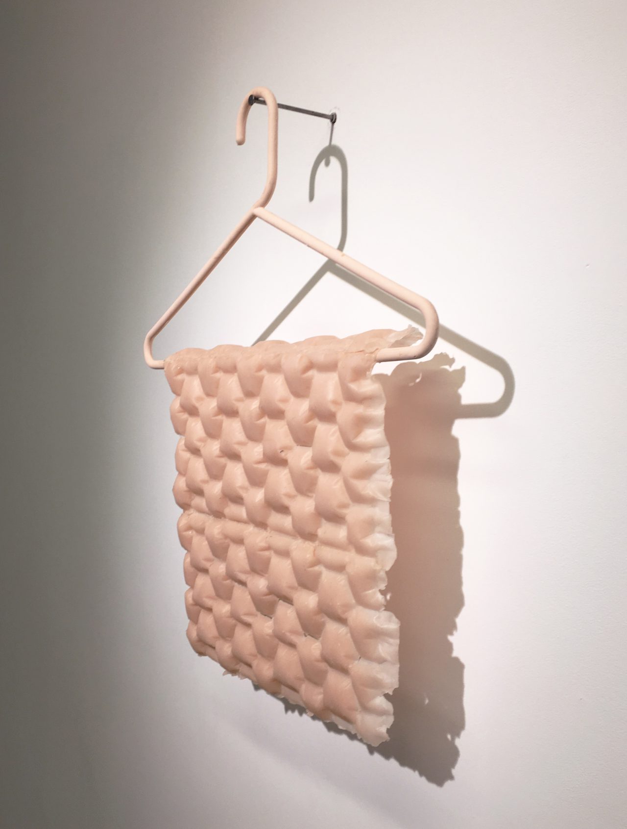 Untitled, 2018,
plaster, microcrystalline wax, beeswax,
54 x 44 x 8 cm